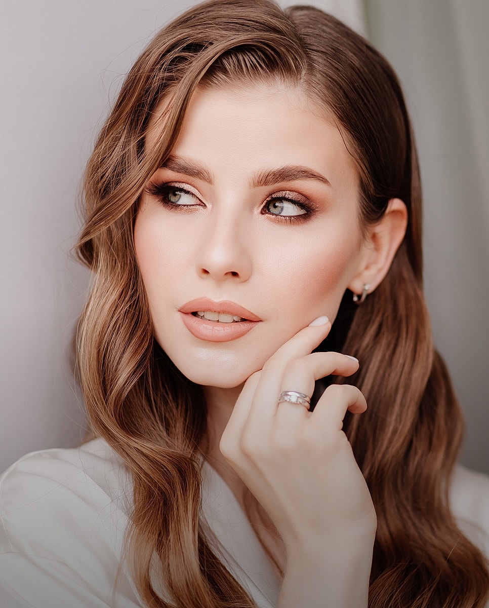Model with elegant hairstyle and makeup portrait.